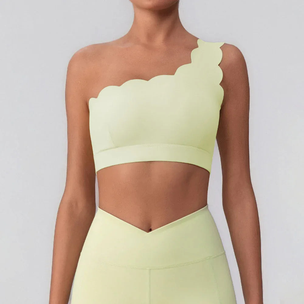 CRAVEBYFW yellow wavy one-shoulder bra tank on model