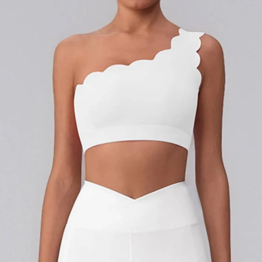 CRAVEBYFW white wavy one-shoulder bra tank on model