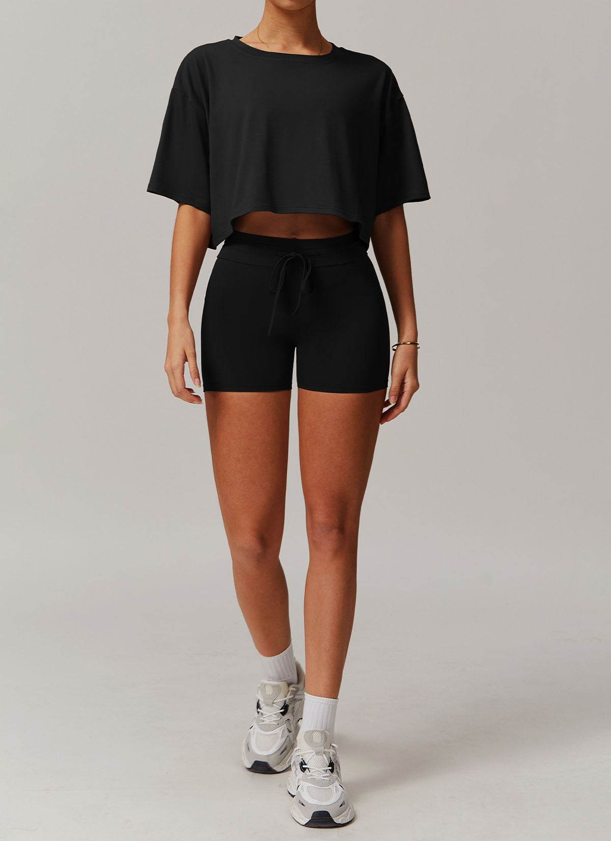 Sports Sets with Short Sleeve T-Shirts and Tight Shorts