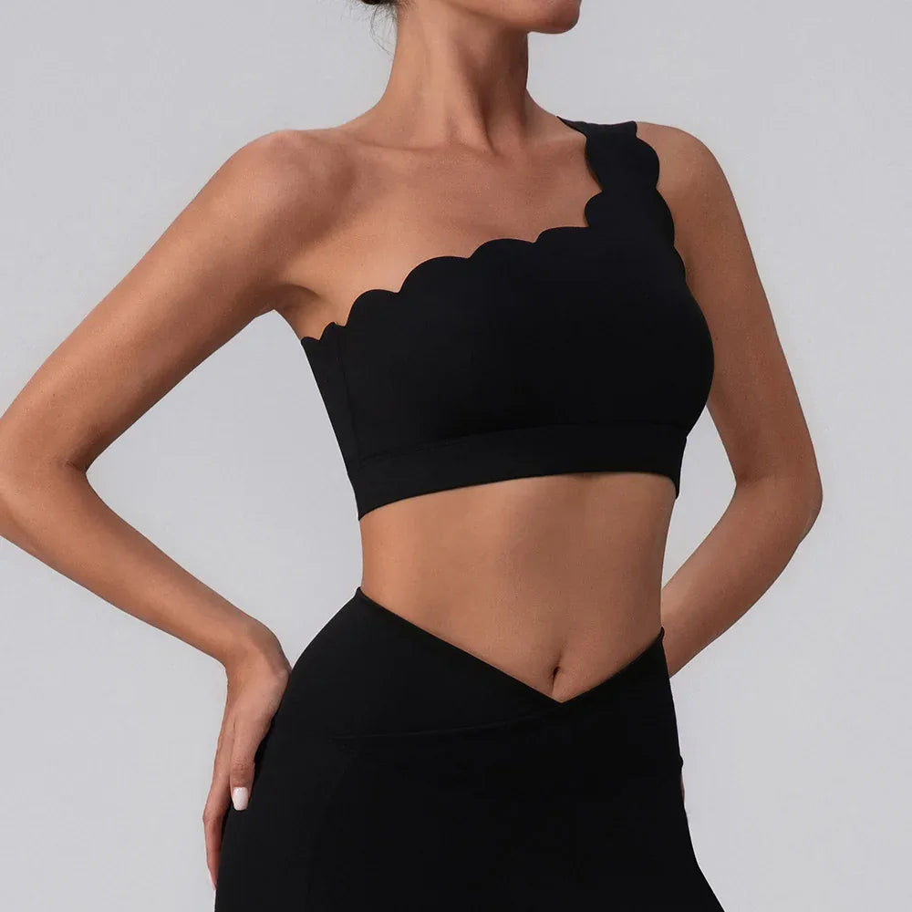 CRAVEBYFW black wavy one-shoulder bra tank on model