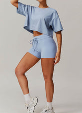 Sports Sets with Short Sleeve T-Shirts and Tight Shorts