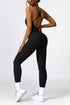 "Scoop Neck Strappy Open Back Active Jumpsuit | Stylish & Comfortable"